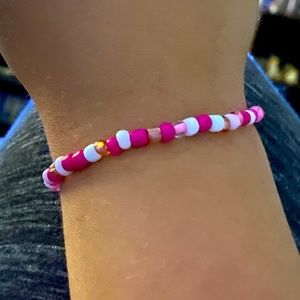 Pink and white bracelet